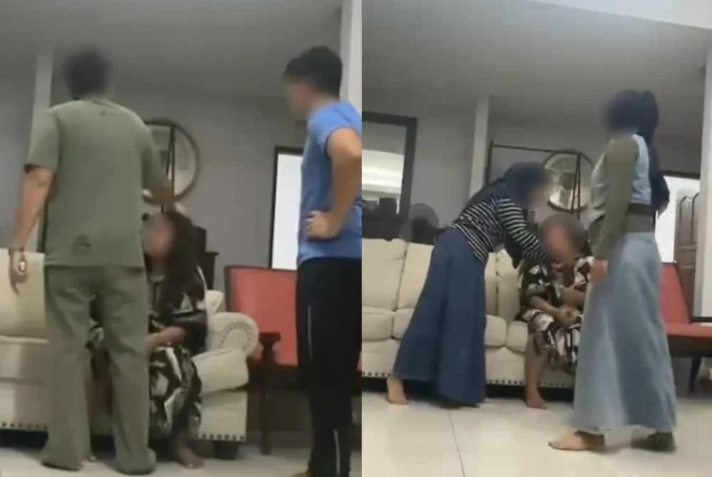 Tangkap layar video tular memaparkan seorang wanita dipercayai pembantu rumah dikasari oleh beberapa individu.