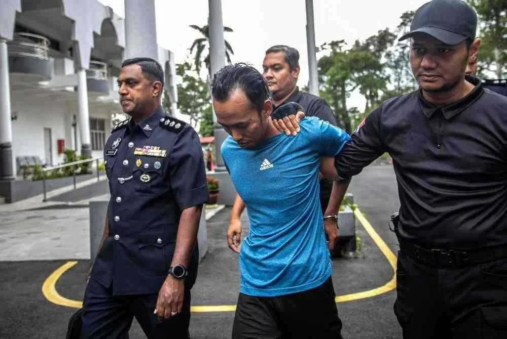 Mengikut pertuduhan, tertuduh didakwa telah melakukan bunuh dengan menyebabkan kematian kepada Muhammad Fahmi Abdullah yang berusia 29 tahun, di tepi Jalan Utama, Jalan Trans Perak dalam daerah Kinta antara 4.30 hingga 5.49 pagi pada 10 Jun lepas. Foto Bernama.