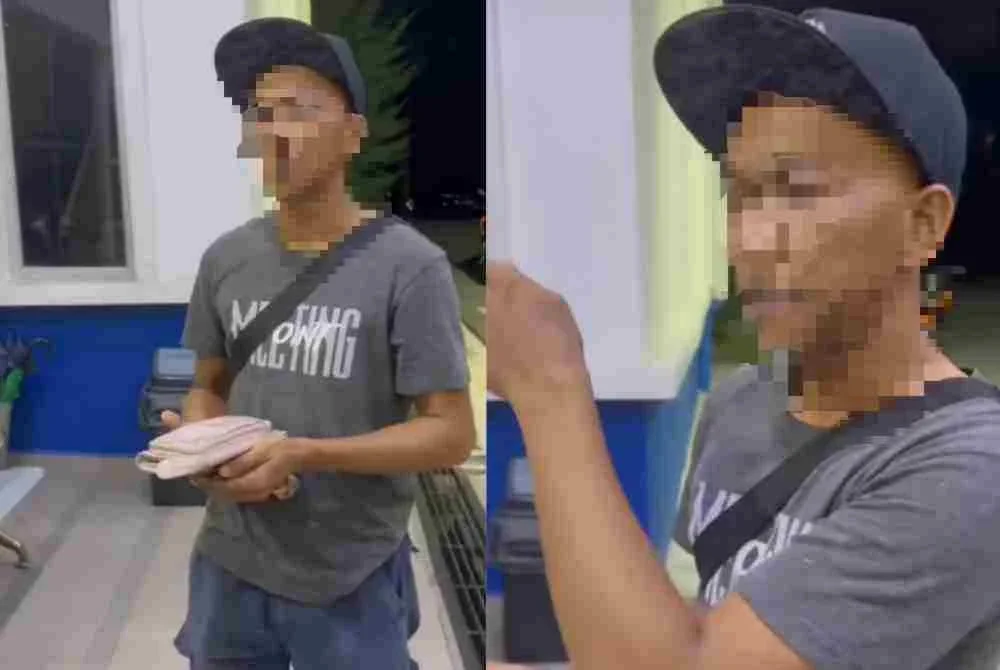 Tangkap layar memaparkan seorang individu yang didakwa tampil menyerahkan dompet milik pasangan warga China itu.