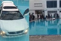 Kereta SUV terjunam ke dalam kolam