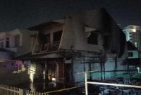 Rumah teres dua tingkat yang disewakan mengikut bilik terbakar dalam kejadian awal pagi Jumaat.