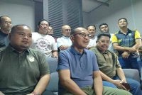 Ahmad (duduk, kanan) turut hadir ketika sidang akhbar bersama Zainol Fadzi (duduk, tengah) pada Khamis. 