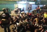 Antara individu warga asing yang ditahan untuk pemeriksaan.