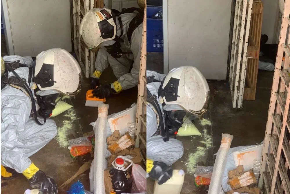 Pasukan Hazmat BBP Bayan Baru sedang menjalankan operasi pembersihan tumpahan merkuri di sebuah syarikat kurier di Jalan Terengganu.