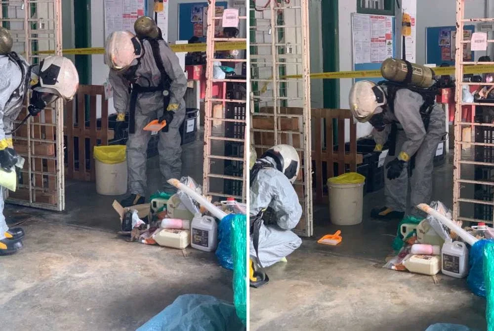 Pasukan Hazmat BBP Bayan Baru sedang menjalankan operasi pembersihan tumpahan merkuri di sebuah syarikat kurier di Jalan Terengganu.