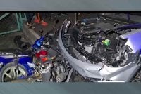 Tangkap layar dari video tular menunjukkan kenderaan dipandu wanita merempuh kereta dan motosikal.