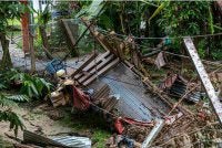 Keadaan jambatan yang runtuh akibat kepala air di Kampung Orang Asli (KOA) Ulu Geruntum. Foto Bernama
