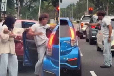Tangkap layar video tular memaparkan insiden seorang lelaki menyerang individu lain selepas berlaku perselisihan faham di atas jalan raya.