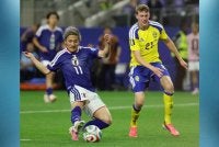 Daizen Maeda (kiri) terlebih dahulu meletakkan Jepun di hadapan pada minit ke-56. Foto: Agensi