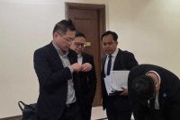 Dr Haw Huo (kiri) ketika hadir untuk memberi keterangan di Mahkamah Koroner Kota Kinabalu.