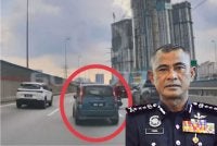 Tangkap layar rakaman video tular sebuah kereta Perodua Viva memecut laju selepas diarah berhenti oleh polis di ibu negara pada Jumaat. - Gambar kecil (Fadil Marsus)