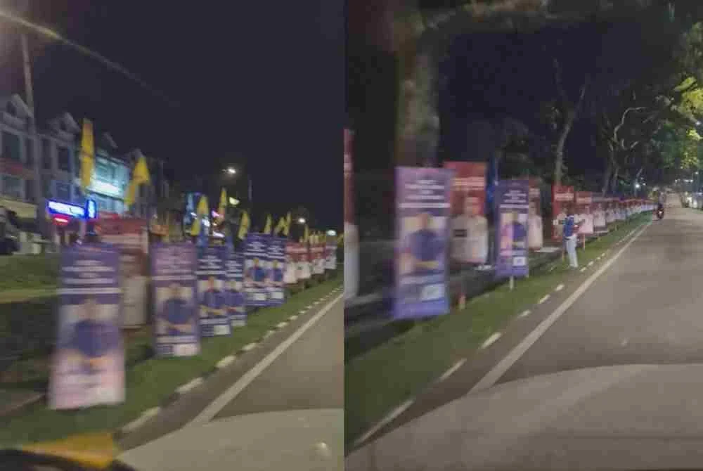 Bahan kempen Mohamad Shafwan didakwa ditutup bahan kempen pihak lawan di Lebuhraya Putra, Bandar Putra.