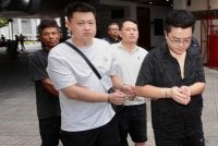Ketiga-tiga tertuduh dibawa ke Kompleks Mahkamah Georgetown pada pagi Jumaat