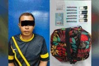 Gambar suspek dan barangan yang dirampas selepas dicekup polis di Kampung Banggol Donas Manir, Kuala Terengganu pada Khamis.