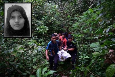Pasukan penyelamat mengusung mayat seorang wanita yang terjatuh dari jambatan Sungai Paka di Jalan Jabor-Paka berhampiran Bandar Al Muktafi Billah Shah semalam setelah ditemukan lemas pagi ini. Foto Bernama Gambar kecil: Nor Haslini)