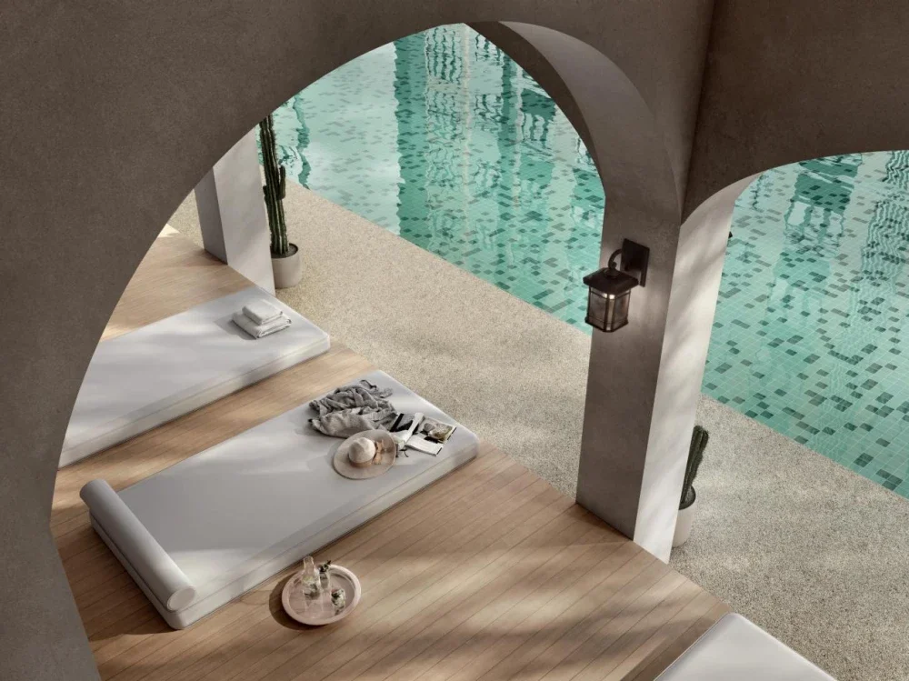 Ilustrasi artis Lounger by the Pool yang menawarkan ruang santai di tepi kolam dalam suasana ala resort.