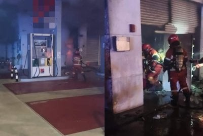 Anggota bomba melakukan.pemeriksaan selepas kebakaran dipadamkan
