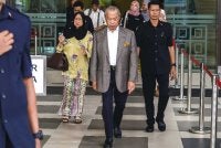 Mahkamah Tinggi hari ini menangguhkan prosiding perbicaraan kes Tan Sri Muhyiddin Yassin yang berdepan 7 pertuduhan menyalahgunakan kedudukan dan pengubahan wang haram ke 13 Julai depan. - Foto: Bernama
