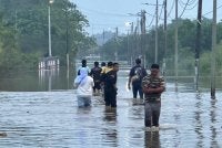 Keadaan banjir melanda Taman Rambai Indah dan sekitarnya susulan hujan lebat dan air pasang pada Sabtu.