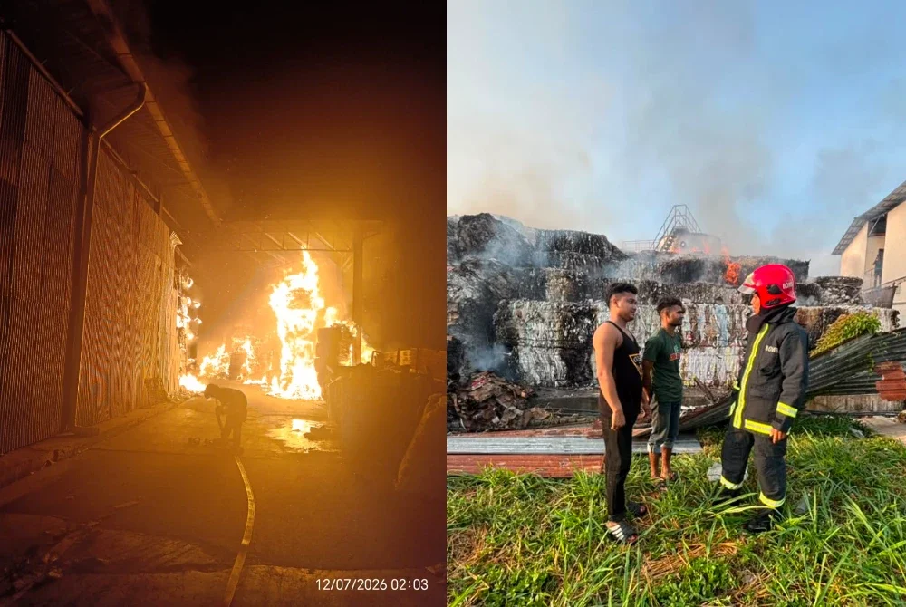 Anggota bomba sedang menjalankan kerja pemadaman pada Ahad.