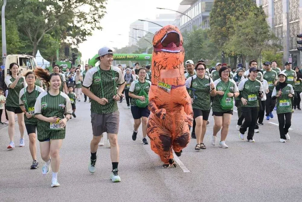 Antara gelagat peserta yang menyertai larian berkenaan.