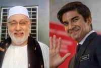 Syed Ali (gambar kiri) berkata, ketabahan yang ditunjukkan Syed Saddiq membuktikan beliau seorang pemimpin muda yang cekal, jujur dan berpegang teguh kepada kedaulatan undang-undang.