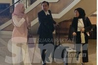 Dr Noor Aishah (kiri) bersama pasukan peguam di Mahkamah Koroner, di Kota Kinabalu.