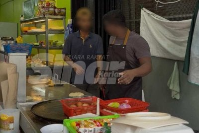 Antara pekerja warga asing yang ditahan kerana gagal menunjukkan dokumen perjalanan sah ketika serbuan Imigresen. Foto NORAFIZA JAAFAR/SINAR HARIAN 