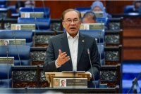Anwar bercakap pada Waktu Pertanyaan-Pertanyaan Menteri di Dewan Rakyat pada Selasa. - Foto: Bernama