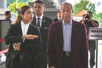 Muhyiddin hadir di Mahkamah Tinggi pada Selasa bagi perbicaraan tujuh pertuduhan menyalahgunakan kedudukan dan pengubahan wang haram. Foto Bernama