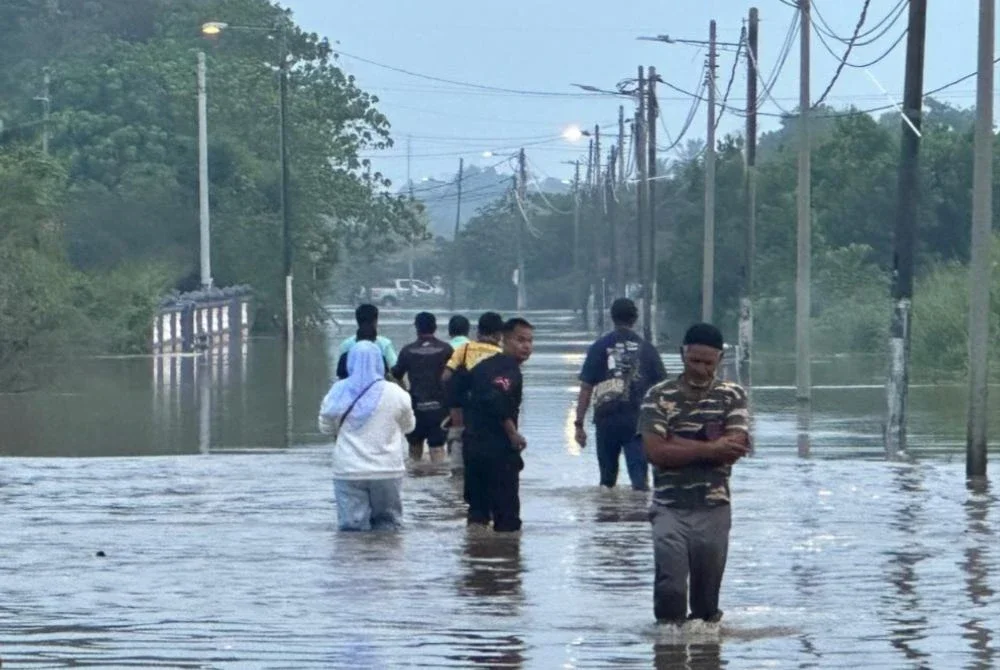Keadaan banjir di Taman Rambai Mas Sabtu lalu.