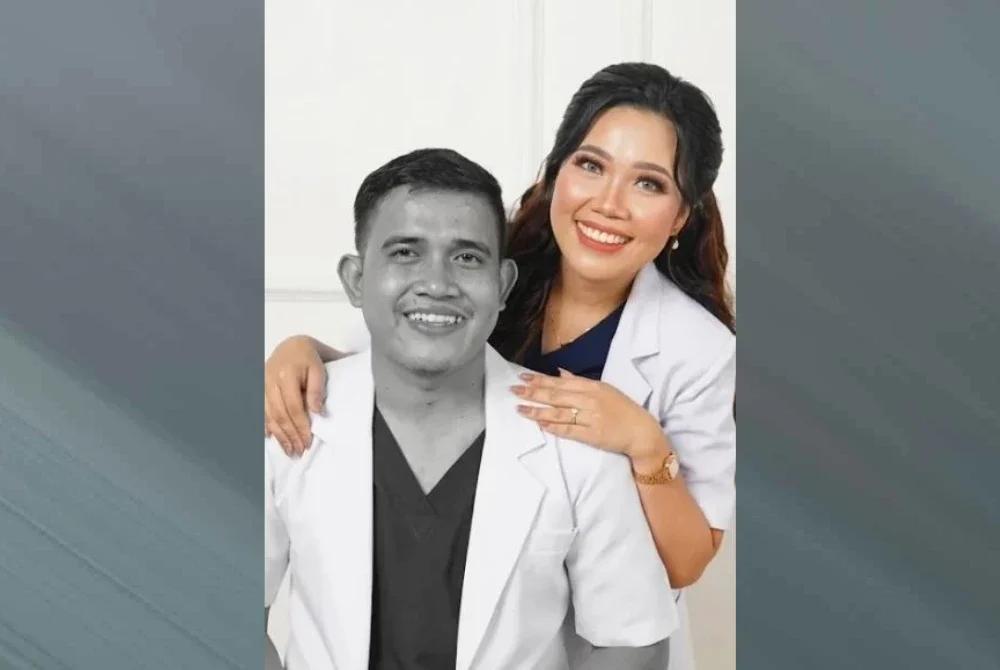 Alex bersama isterinya. 