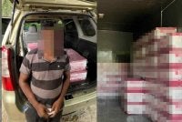 Dua lelaki mencurigakan yang sedang memindahkan sejumlah kotak dari lori ke dalam MPV di Jalan Berai di sini membongkar kegiatan penyeludupan minuman keras pada Selasa.