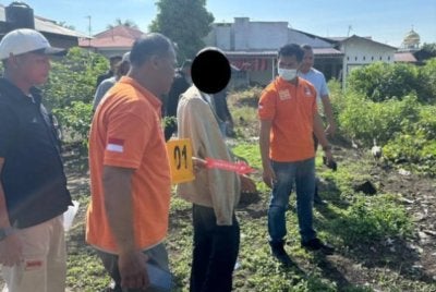 Polis menjalankan siasatan di lokasi kejadian di MAN 3 Padang, Sumatera Barat. Foto Detik.com