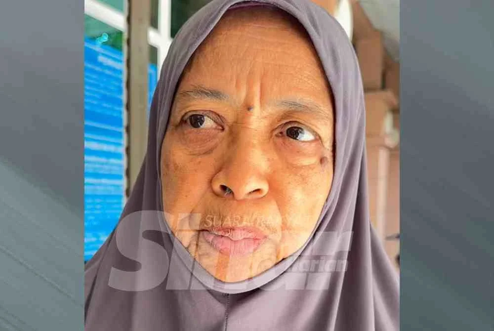 Ibu kepada mangsa, Salmah Shamsudin.