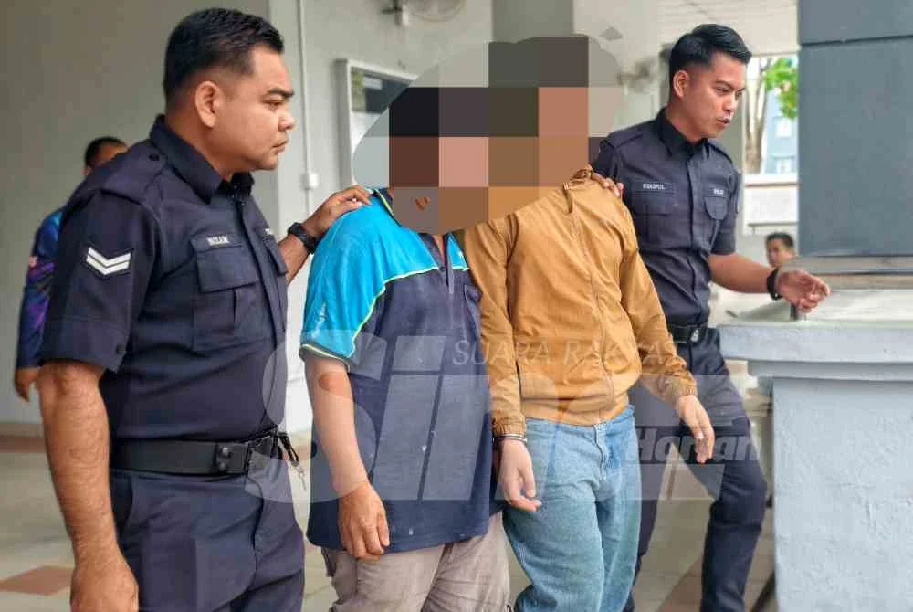 Perintah reman terhadap suspek (berbaju coklat) dikeluarkan oleh Penolong Kanan Pendaftar, Naeilah Nikrul Tarmizi di Mahkamah Majistret pada Ahad.