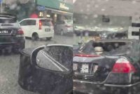Tular di media sosial menerusi beberapa tangkap layar video yang memaparkan dua kenderaan rosak pada bahagian bumbung dipercayai akibat dihempap tangki air.