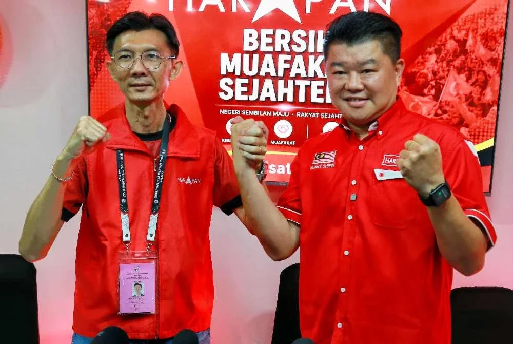 Kenny (kanan) dan Boon Lye saling sokong menyokong antara satu sama lain.