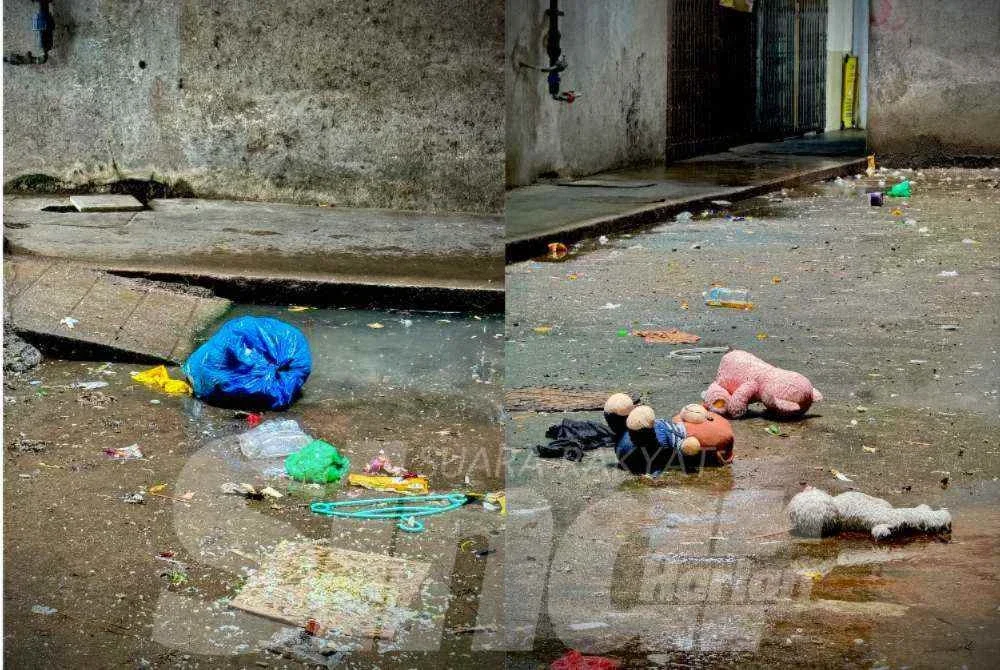 Sampah dan patung permainan kanak-kanak ini dipercayai dibuang dari tingkat atas flat terbabit.