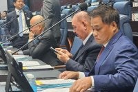 Masiung (kanan) ketika menghadiri sidang DUN Sabah pada Isnin.