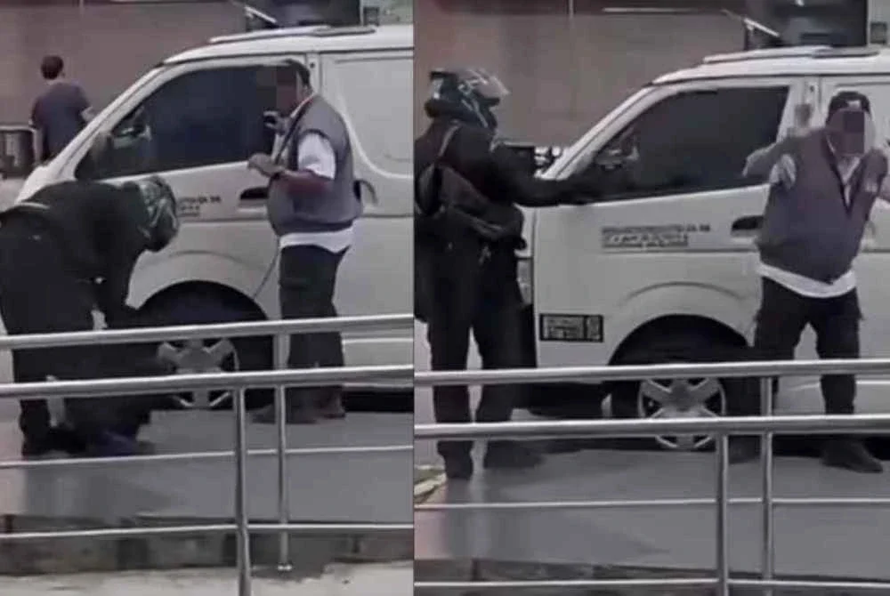 Tangkap layar rakaman video tular memaparkan tindakan suspek berpakaian serba hitam cuba menyamun wang tunai RM82,000 di hadapan sebuah bank di Bandar Bukit Tinggi, Klang pada Isnin.