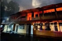 Kebakaran membabitkan asrama lelaki sekolah berkenaan. Foto Bomba