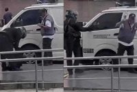 Tangkap layar rakaman video tular memaparkan tindakan suspek berpakaian serba hitam cuba menyamun wang tunai RM82,000 di hadapan sebuah bank di Bandar Bukit Tinggi, Klang pada Isnin.
