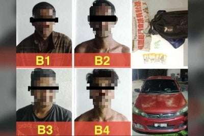 Keempat-empat lelaki yang ditahan dalam sebuah kereta di Bachok. 
Foto PDRM