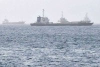 Kapal-kapal yang melalui Teluk Oman dirakam di luar pesisir Muscat pada 25 Julai 2026. Satu insiden membabitkan sebuah kapal tangki dan pasukan tentera yang tidak dikenal pasti dilaporkan berlaku pada 25 Julai berhampiran laluan perairan Selat Hormuz, menurut pemantau Operasi Perdagangan Maritim United Kingdom. - AFP