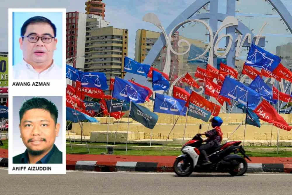 Bendera parti yang bertanding memenuhi sepanjang jalan di sekitar bulatan Port Dickson menjelang Pilihan Raya Negeri (PRN) Negeri Sembilan sebelum hari pengundian pada 1 Ogos.