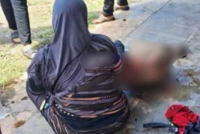 Keadaan isteri dan anak Talhah selepas terlibat kemalangan di Persimpangan Buluh Gading, Kuala Nerus pada Jumaat.