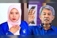  Siti Nur Umaira (kiri) dan Mohamad. Foto Bernama