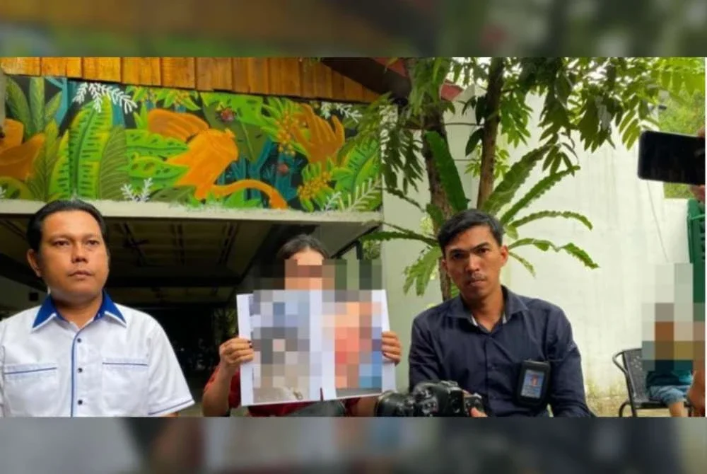 Ibu kepada bayi berusia lapan bulan yang didakwa dijual oleh bapa kandungnya di Jambi hadir bersama peguamnya ketika memberi kenyataan kepada media. Foto: DetikSumbagsel