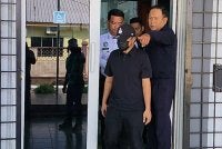 Tertuduh dibawa keluar dari Mahkamah Majistret Pekan selepas selesai pertuduhan pada Isnin.